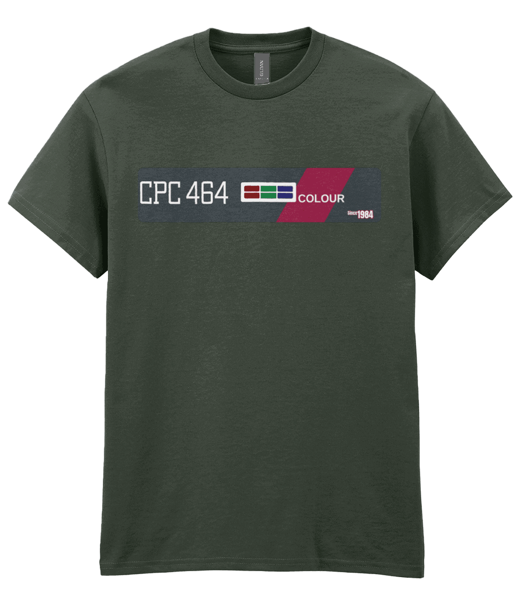 Green T-Shirt echoing the original Amstrad CPC 464 computer bezel. Features ‘CPC 464’ in bold white text on the left, an RGB color bar, and the word ‘COLOUR’, diagonally across a maroon stripe—mirroring the machine’s iconic styling. A small label on the right reads ‘Since 1984’, celebrating the computer’s launch year and legacy