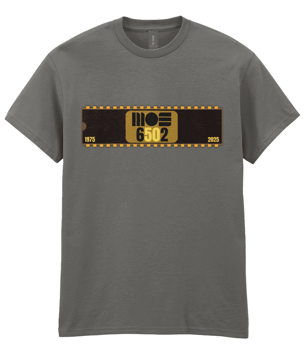 Charcoal T-shirt with a 40 pin chip across the front with MOS 6502 and 1975 2025 written on it. The five and the zero is yellow denoting the 50th year