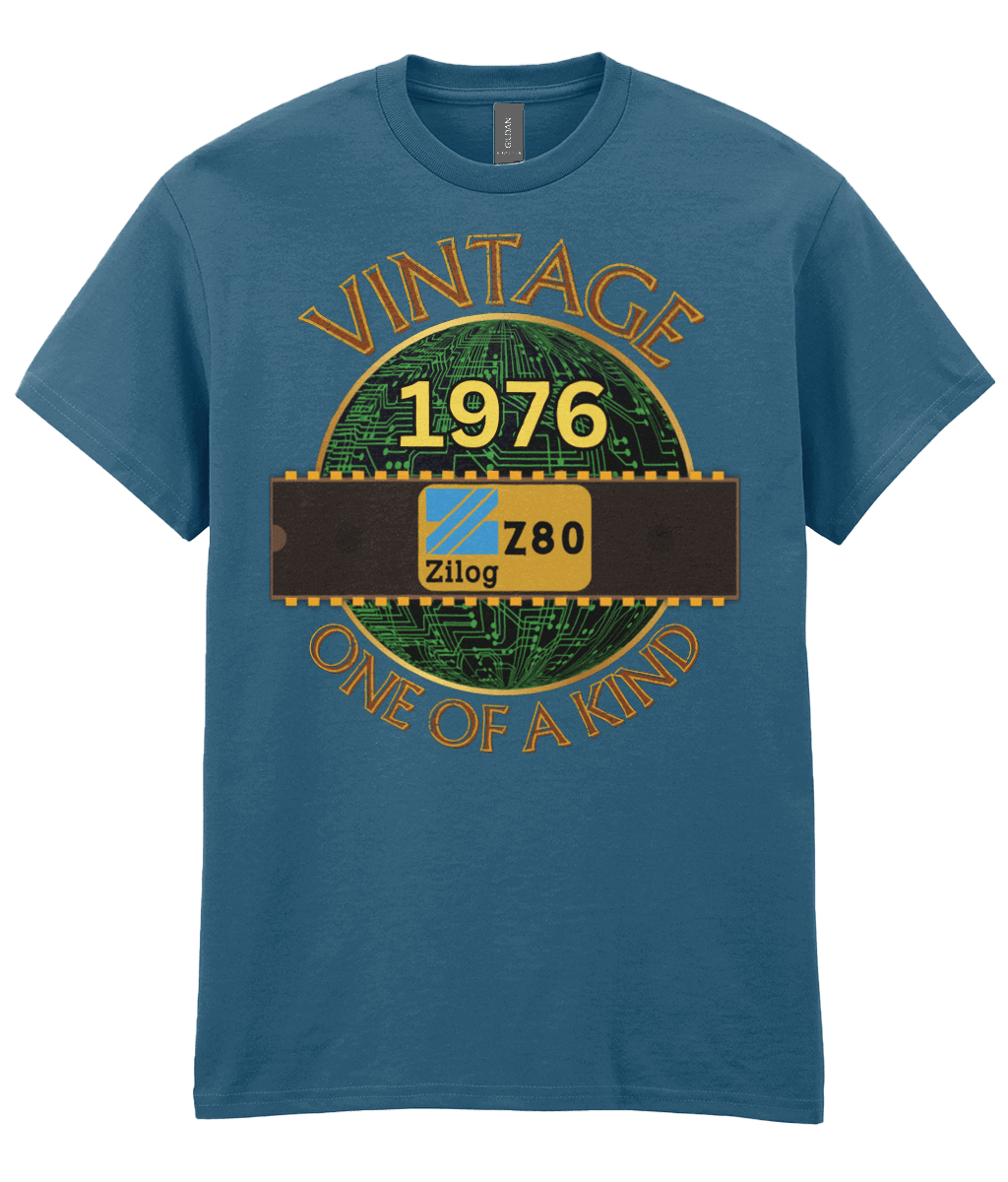 Indigo T-shirt with a gold circle with a basic representation of a circuit board in green and a 40 pin chip across the front with Zilog z80 and 1976 written on it. Vintage one of a kind around the circle