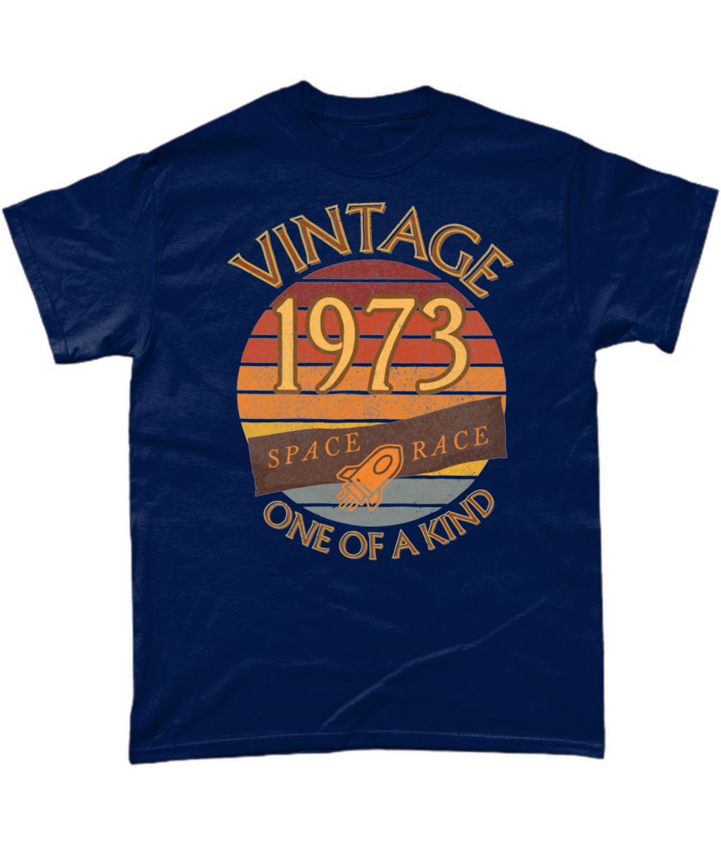 Navy T-Shirt with words vintage,1973,space race,one of a kind, image of a simple rocket in front of a brown distressed sunset
