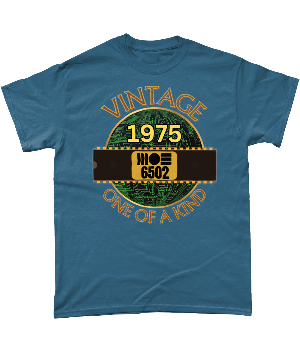 Indigo T-shirt with a gold circle with a basic representation of a circuit board in green and a 40 pin chip across the front with MOS 6502 and 1975 written on it. Vintage one of a kind around the circle