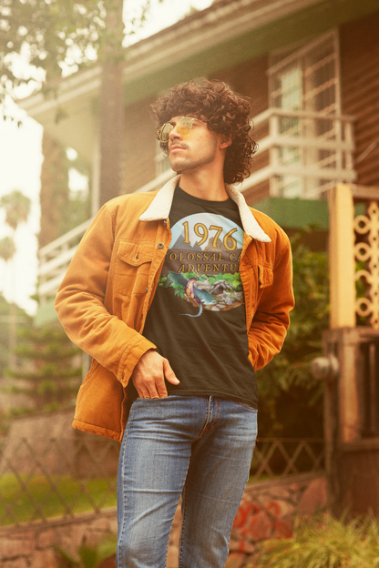 A man wearing a black T-Shirt with words,1976,colossal cave adventure,circular picture of a dragon,cave and woodland,blue skyBlack T-Shirt with words,1976,colossal cave adventure,circular picture of a dragon,cave and woodland,blue sky,daytime