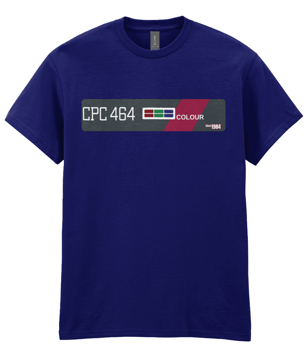 Navy T-Shirt  echoing the original Amstrad CPC 464 computer bezel. Features ‘CPC 464’ in bold white text on the left, an RGB color bar, and the word ‘COLOUR’, diagonally across a maroon stripe—mirroring the machine’s iconic styling. A small label on the right reads ‘Since 1984’, celebrating the computer’s launch year and legacy
