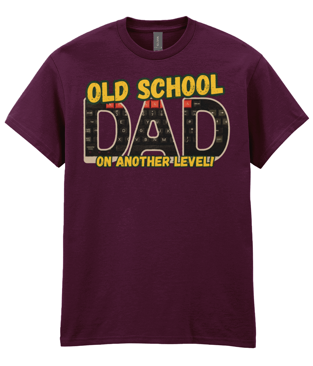 “Maroon T‑shirt with ‘Old School Dad On Another Level’ text and BBC Micro Model B keyboard artwork inside the letters.” 