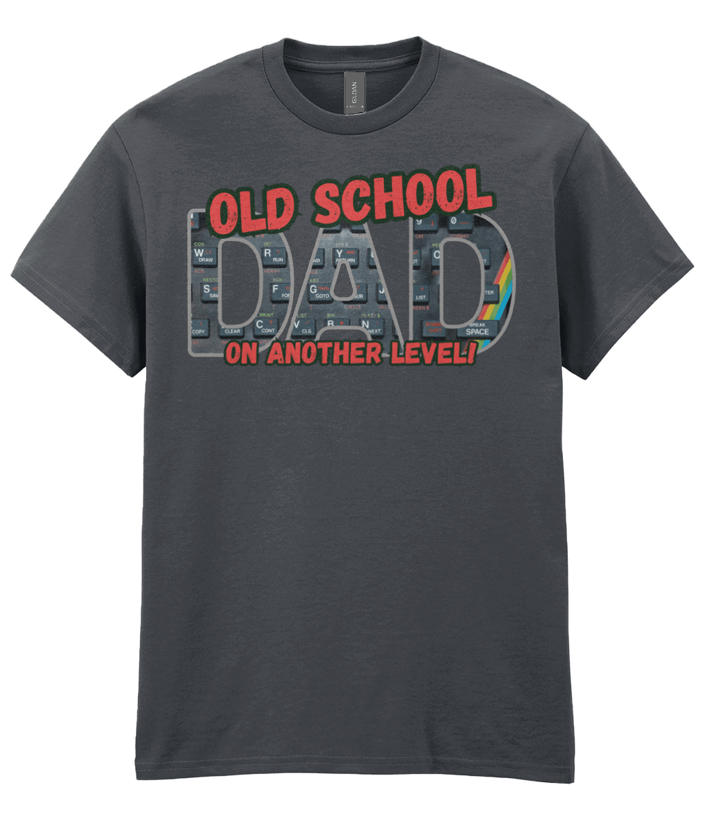 “Tweed T‑shirt with ‘Old School Dad On Another Level’ text and ZX Spectrum‑style keyboard graphic with rainbow stripe.”