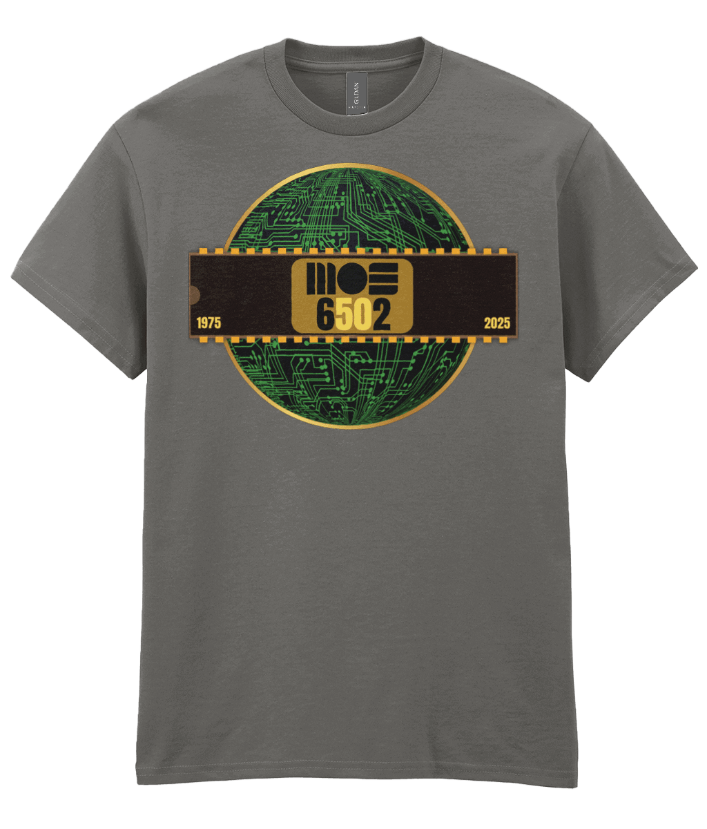 6502 cpu , charcoal tee ,  gold circle & a basic representation of a circuit board in green and a 40 pin chip across the front with MOS 6502  and 1975 2025 written on it. The five and the zero is yellow denoting the 50th year