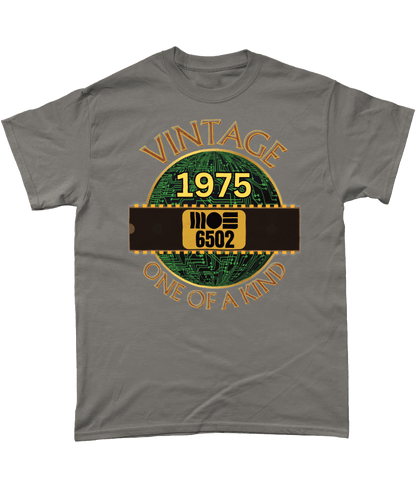 Charcoal T-shirtBlack with a gold circle with a basic representation of a circuit board in green and a 40 pin chip across the front with MOS 6502 and 1975 written on it. Vintage one of a kind around the circle