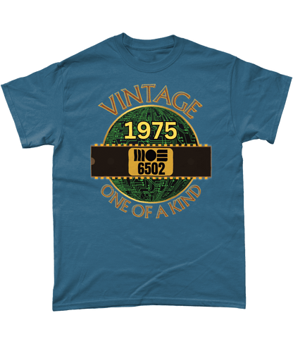 Indigo T-shirt with a gold circle with a basic representation of a circuit board in green and a 40 pin chip across the front with MOS 6502 and 1975 written on it. Vintage one of a kind around the circle