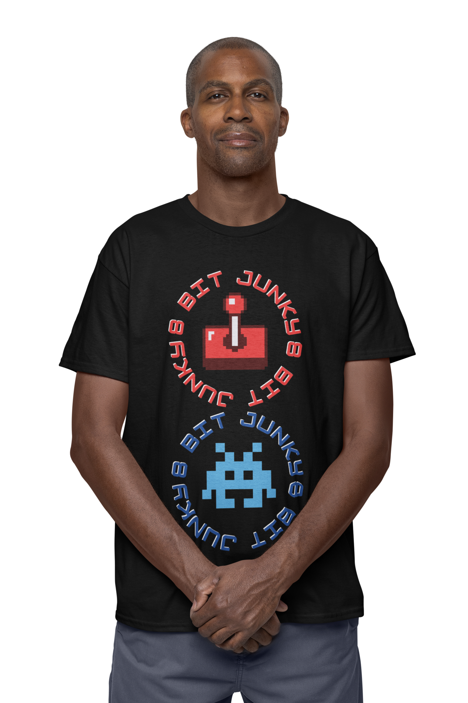 A man wearing a black T-Shirt with words 8-bit junky in 2 circles making a figure 8 with an invader in one circle and joystick in the other