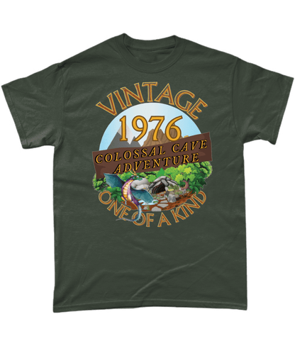 Green T-Shirt with words vintage,1976,colossal cave adventure,one of a kind,circular picture of a dragon,cave and woodland,blue skyBlack T-Shirt with words,1976,colossal cave adventure,circular picture of a dragon,cave and woodland,blue sky,daytime